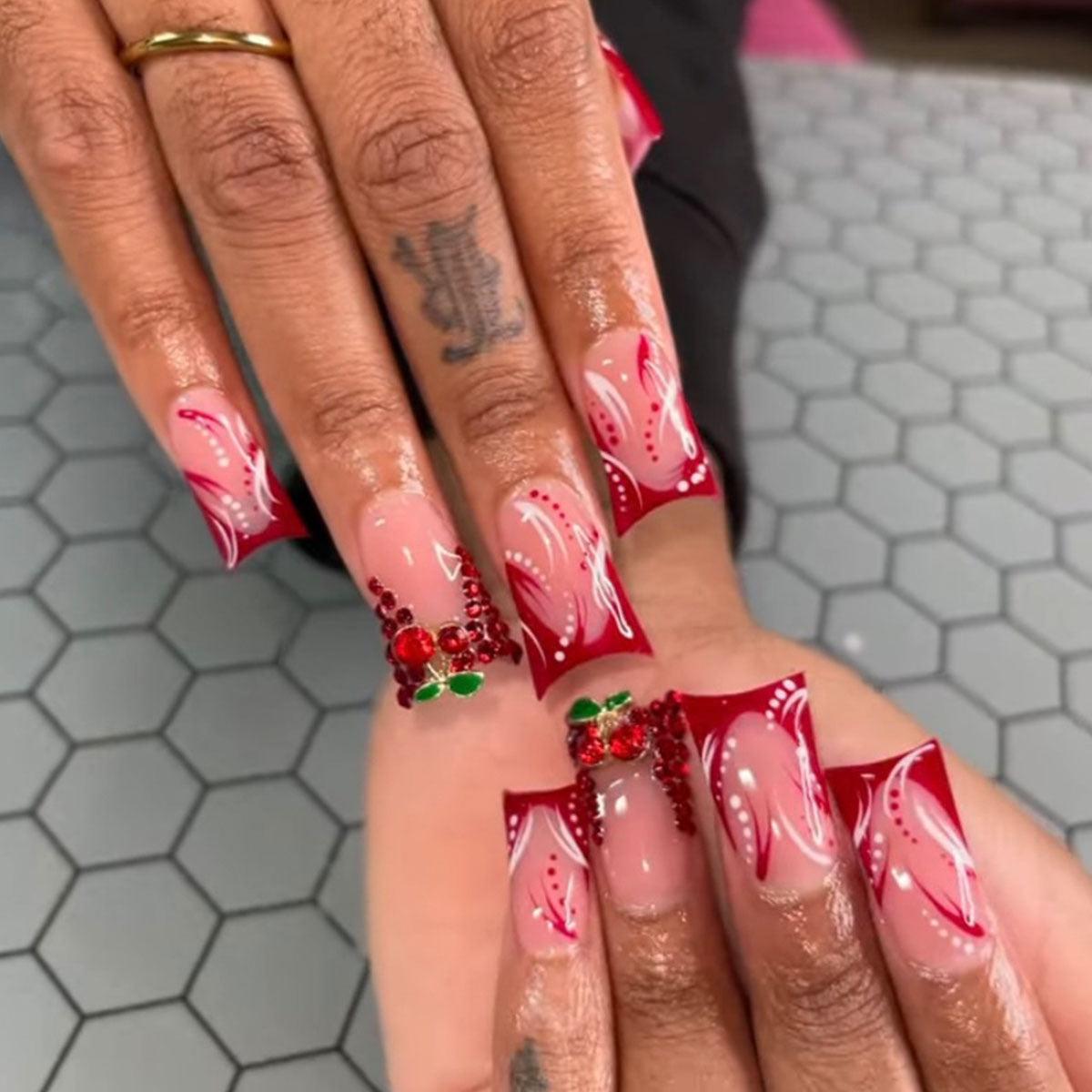 Festive Charm Long Duck Red and White Press On Nails with Swirl Patterns and Rhinestone Embellishments