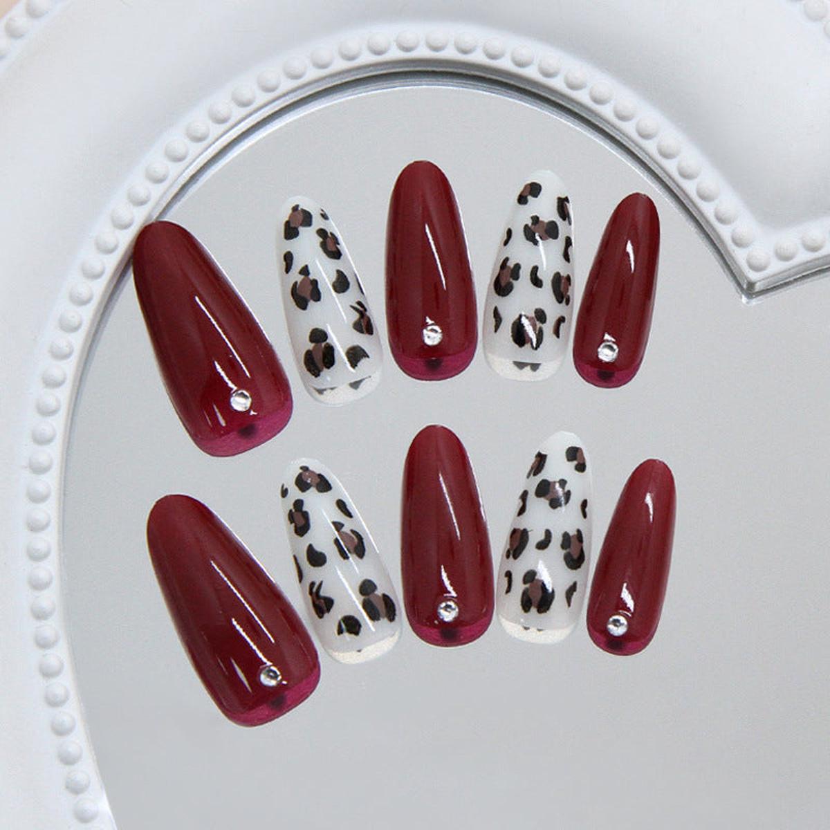 Wild Elegance Luxurious Long Almond-Shaped Deep Red and Chic Animal Print Nail Set with Sparkling Gems