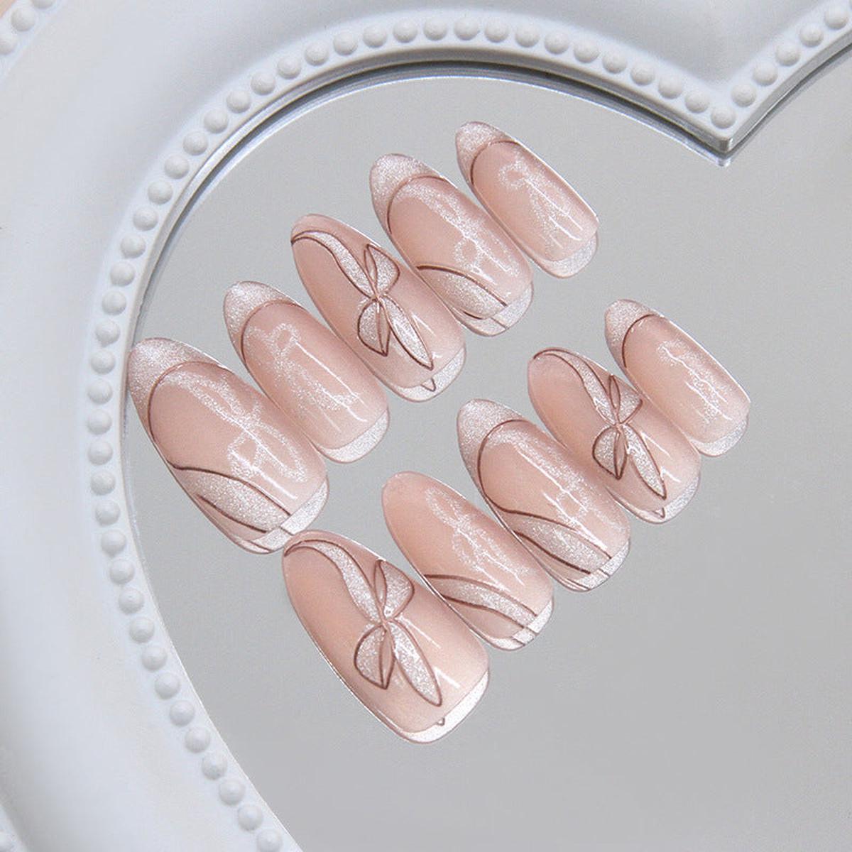 Whimsical Elegance Long Almond Pink Nails with Shimmering Bow Design