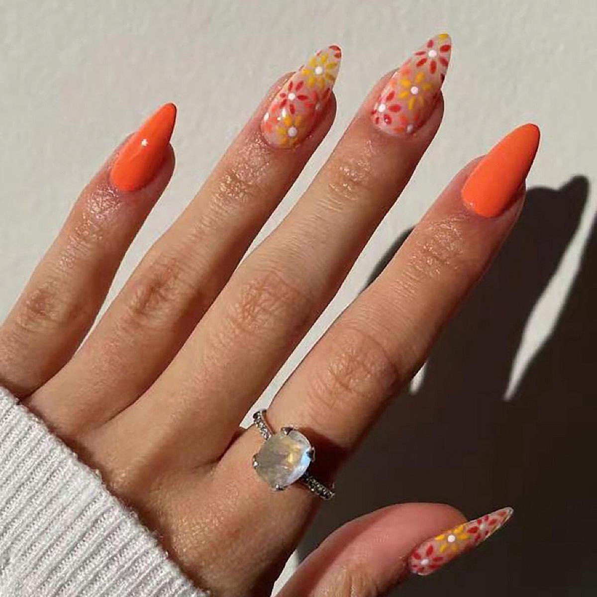 Using heat Medium Almond Orange Vacation Press On Nails