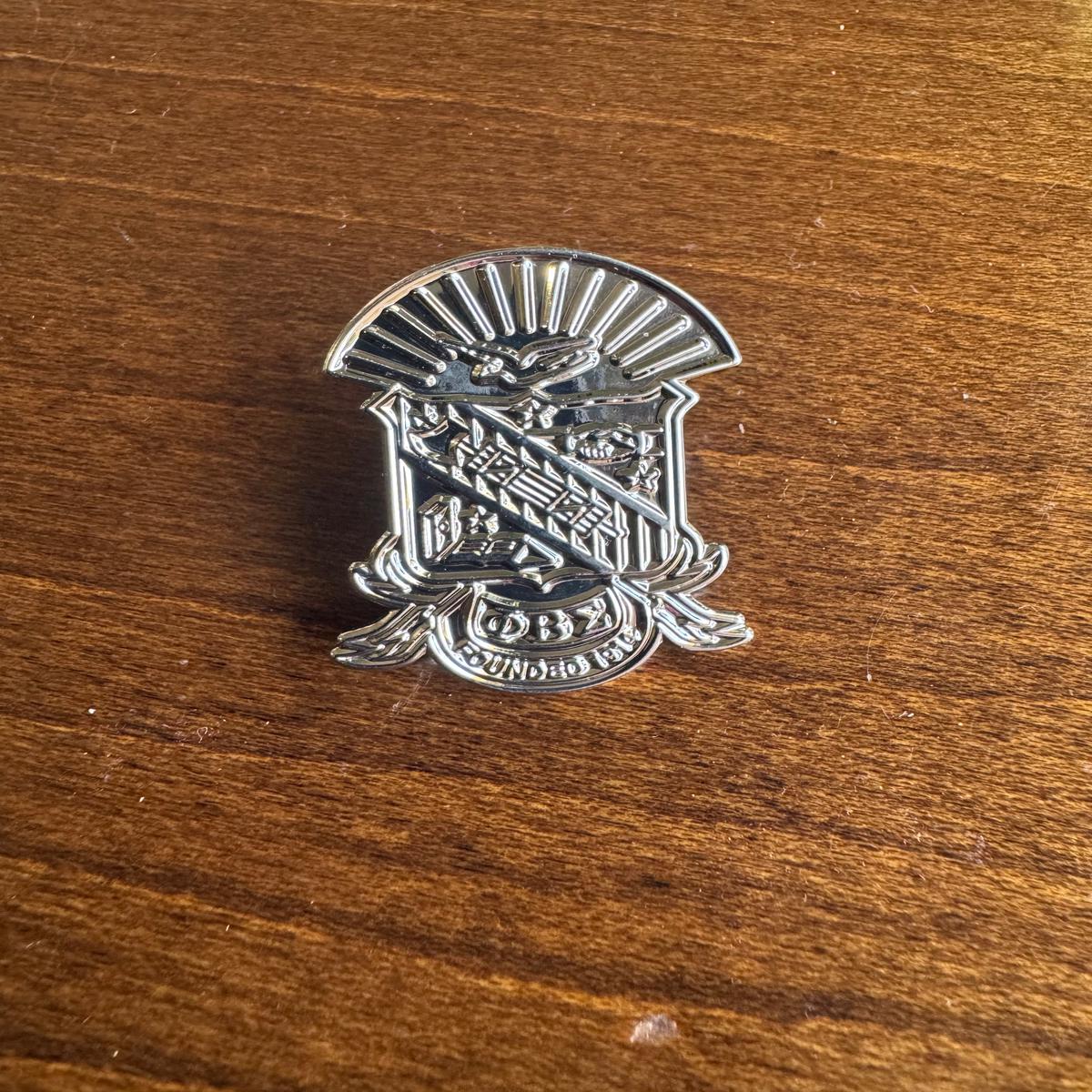 Sigma Shield Silver lapel pin